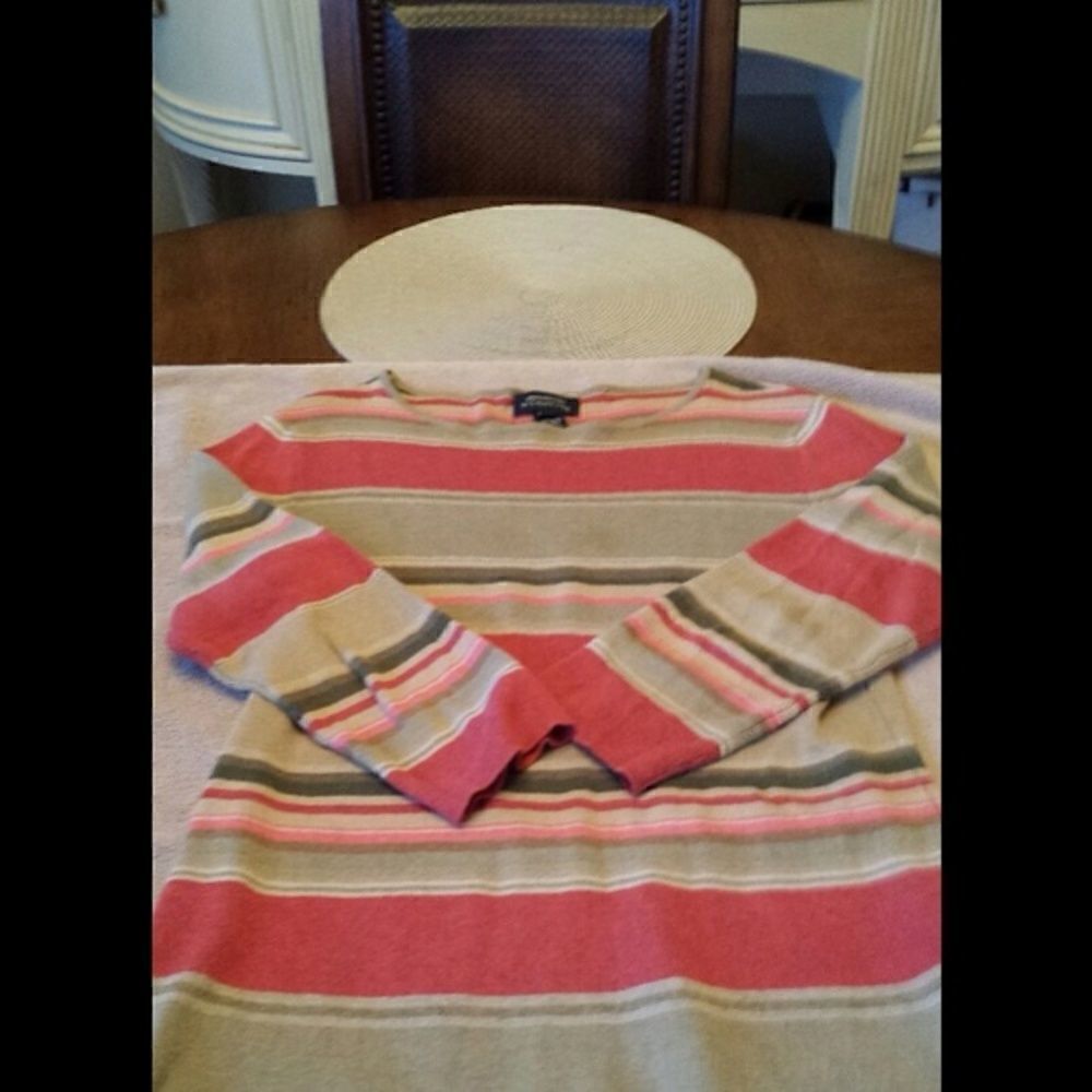 Green and red striped sweater